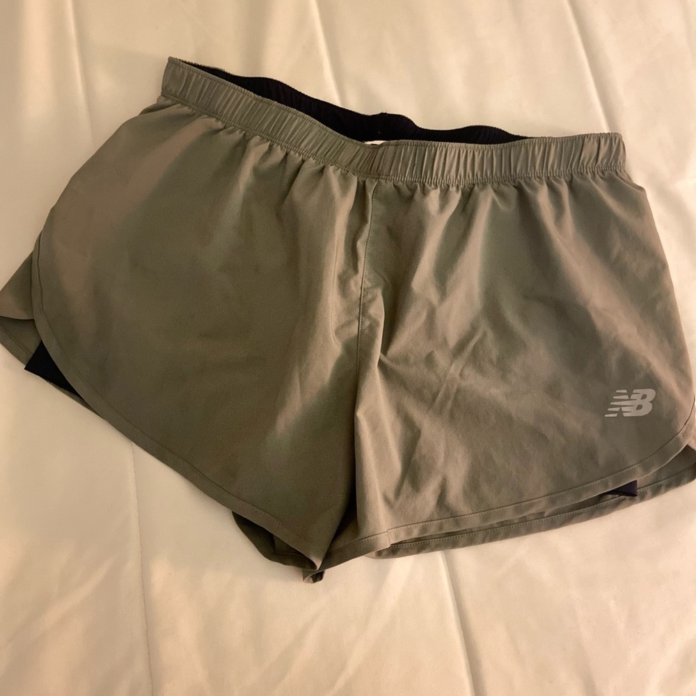 New Balance green athletic shorts